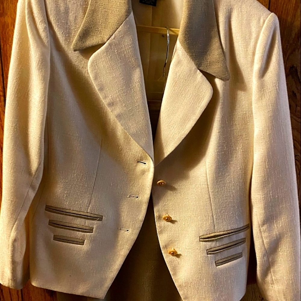 Beigh color interview suit for women. Only worn a few times. Excellent condition